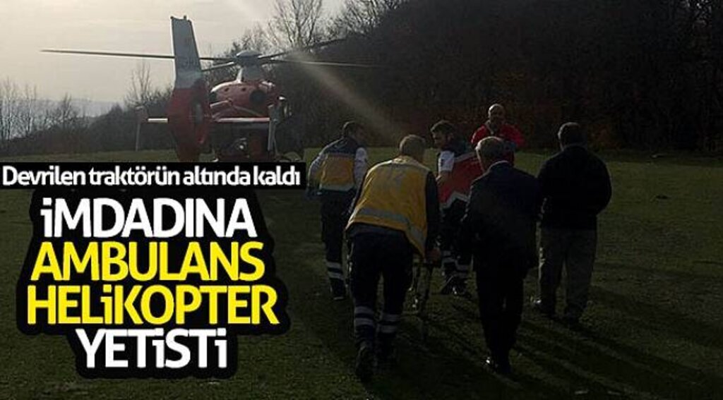 Devrilen traktörün altında kaldı