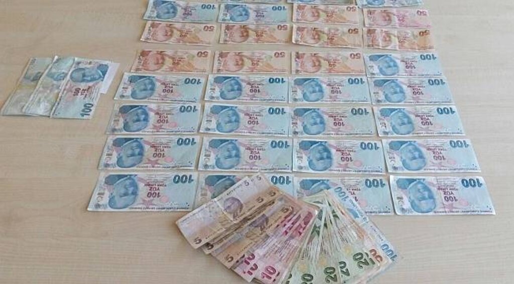 Alaçam'da sahte para ele geçirildi